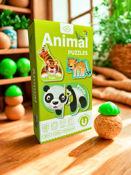Box packaging of Magnimoo magnets animals puzzle featuring tiger, panda, and leopard illustrations for kids aged 3 and up.