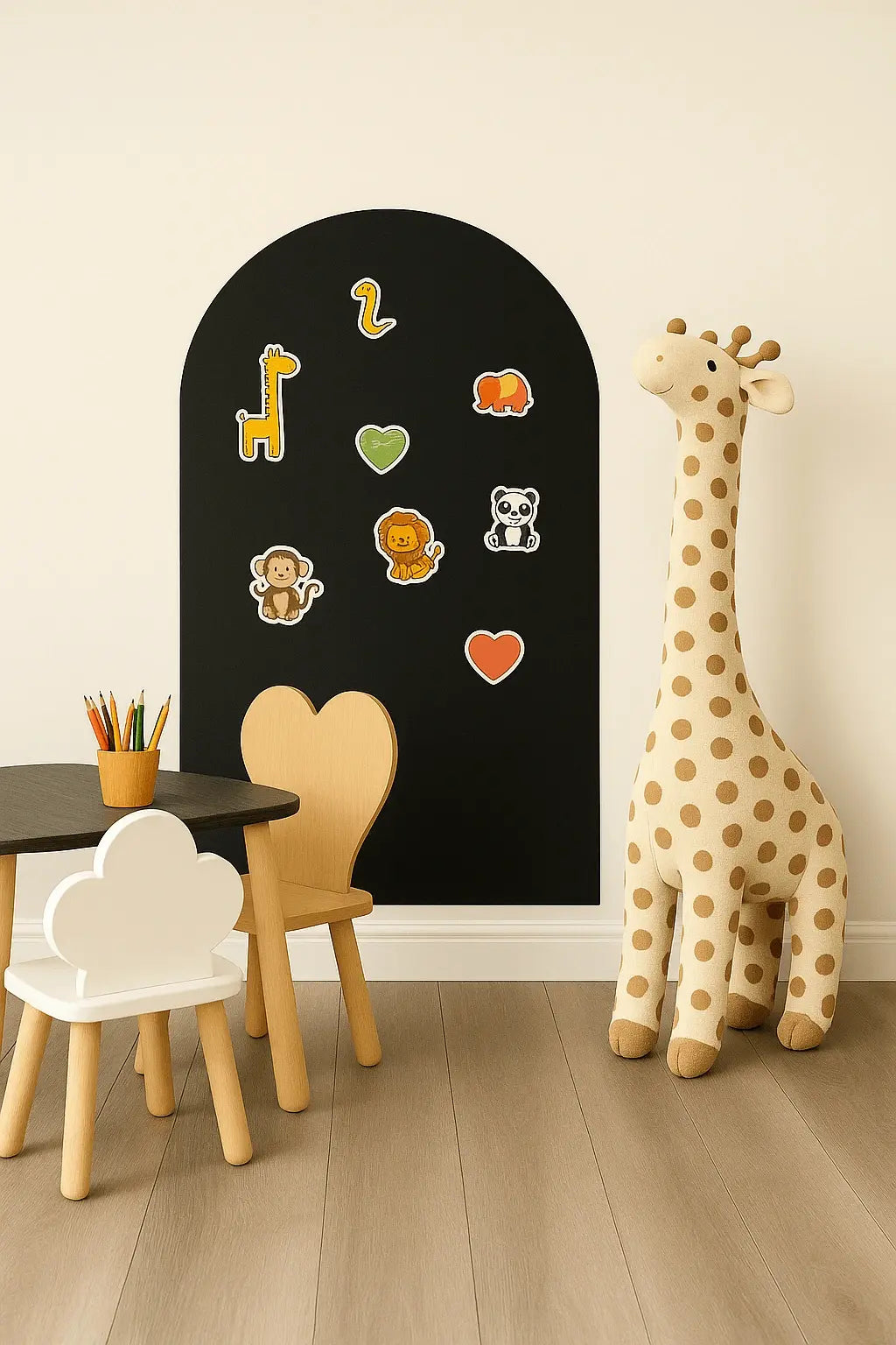 Black Mystery magnet board by Magnimoo shown with animal magnets in a Montessori-inspired kids’ playroom setup.