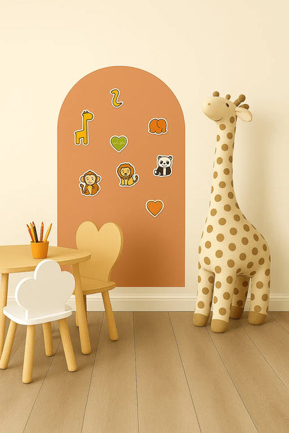 Burnt Amber magnet board by Magnimoo shown with animal magnets in a Montessori-inspired kids’ playroom setup.
